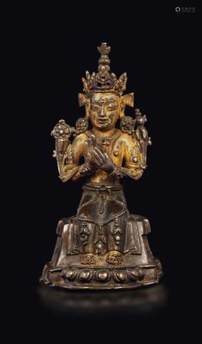 A gilt bronze figure of Maitreya with semi-precious stone  ...