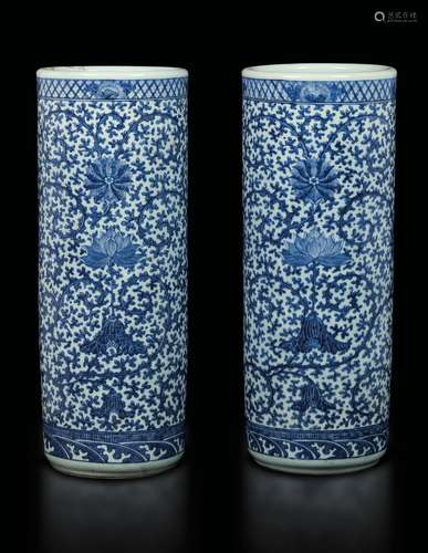 A pair of blue and white cylindrical vases with lotus flower  ...