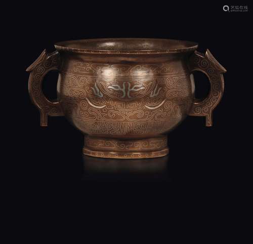 A bronze censer with silver inlays with archaic style decoration  ...