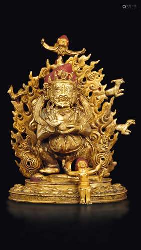 A gilt bronze figure of Gur-Mahakala with animals on the aura,  ...