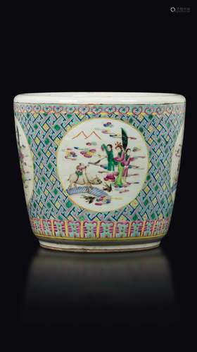 A polychrome enamelled porcelain cachepot with Guanyin within  ...