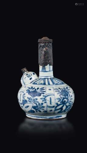 A blue and white pitcher with floral decoration, China, Ming  ...