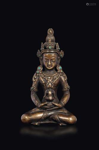 A bronze figure of Amithaba with jadeite inlays, Tibet, 19th  ...