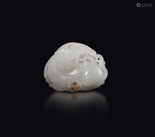 A small white jade group with dog on a leaf with branches,  ...