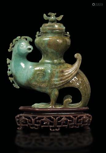 A green and russet jade phoenix vase, China, early 20th ce ...