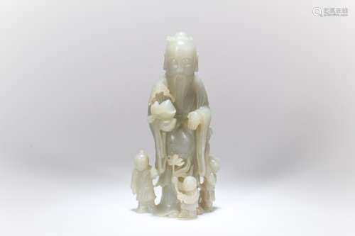 A Chinese Carved Jade Figure of Man