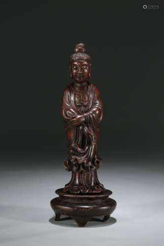 A Chinese Carved Chenxiang Wood Guanyin Figure
