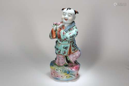 A Chinese Famille-Rose Porcelain Boy Statue