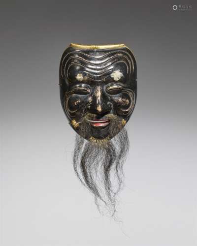 Nô-Maske vom Typ Okina. Holz, farbig gefasst. 19. Jh.