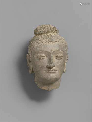 Kopf eines Buddha. Grauer Schist. Pakistan, Gandhara. 2./3. Jh.