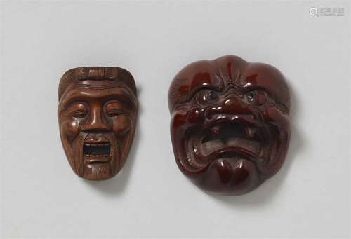 Zwei Masken-Netsuke. Holz. Spätes 19. Jh.