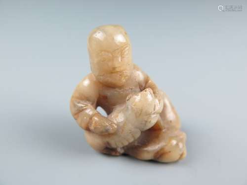 A Chinese Carved Jade Rohan