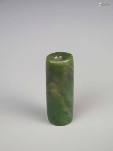 A Chinese Green Jade Tube