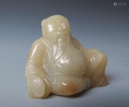 A  Chinese White Jade Carved Immortal