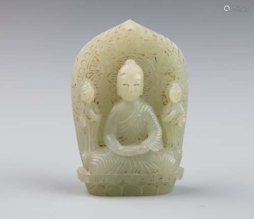 A Chinese light greenish white jade of shakyamuni