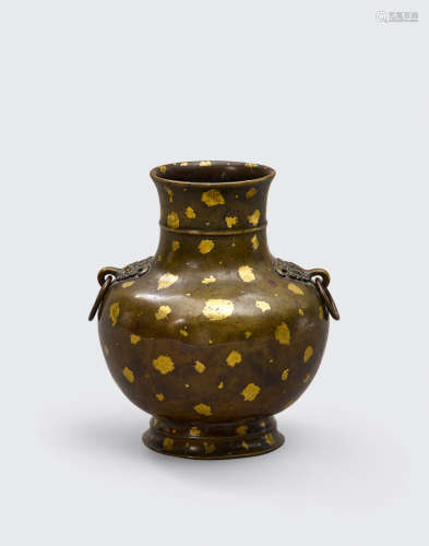 Xuande mark, 18th century A gilt-splashed bronze two-handled vase