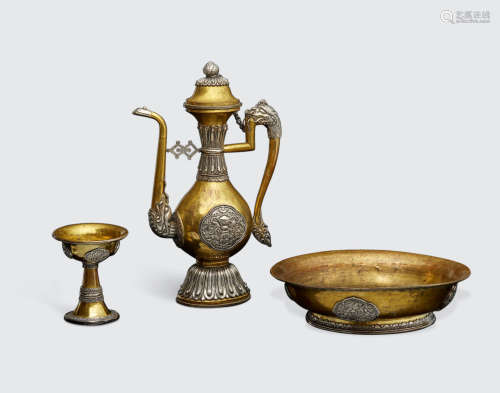 Tibet, 19th century A GROUP OF THREE GILT COPPER ALLOY AND SILVER RITUAL VESSELS