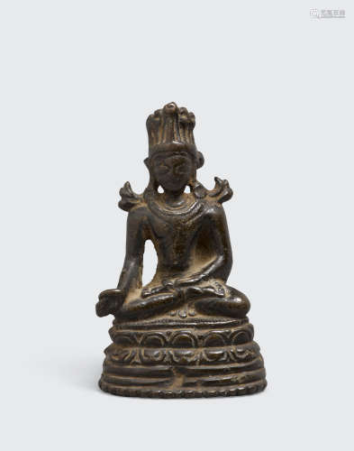 Tibet, Pala style, circa 12th century A Copper alloy figure of Ratnasambhava
