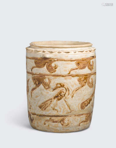 Ly-Tran dynasty, 12th-14th century A cream glazed storage jar with brown inlay bird decoration