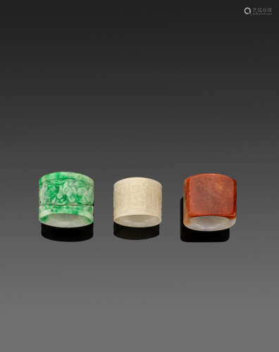 A group of three jade archer's rings