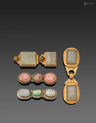 Qing dynasty A GROUP OF FOUR GILT-METAL HARDSTONE MOUNTED BELT BUCKLES