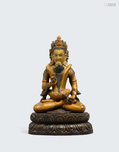 Qing dynasty, 17th century A polychrome gilt lacquered wood figure of Vajrasattva and Vajragarvi