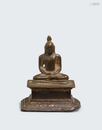 Nagapattinam, 14th-16th century  A copper alloy figure of Buddha