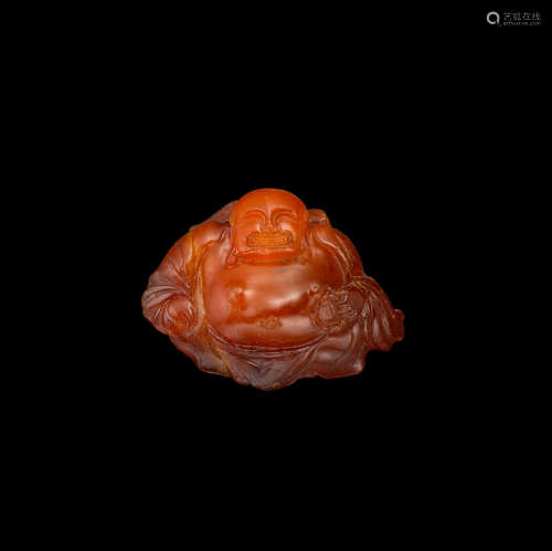17th century An amber carving of the Budai heshang