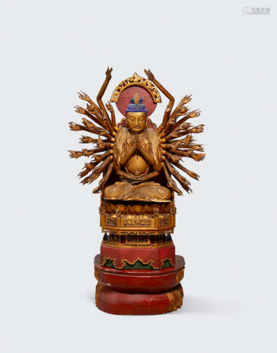 Qing dynasty A gilt lacquer wood figure of the Thousand-Armed Guanyin