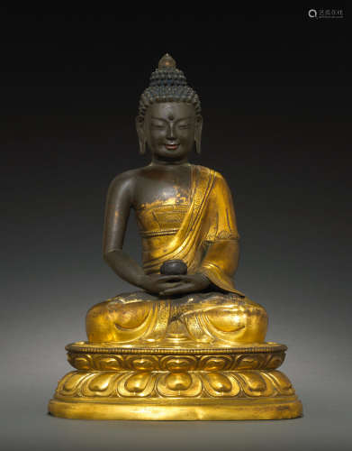 Qing dynasty, 18th century A large gilt copper alloy figure of Buddha