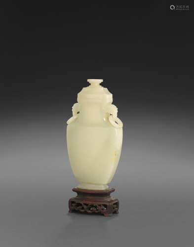 19th century A CELADON JADE VASE AND COVER