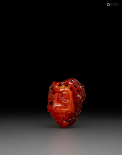 Late 19th/early 20th century A Carved Amber Snuff Bottle
