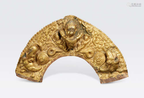 Tibet or Nepal, 18th/19th century A gilt copper alloy repoussé panel of Garuda