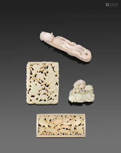 A group of four jade carvings