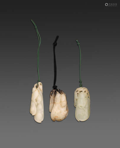 Late Qing/Republic period A group of three carved jade vegetable pendants