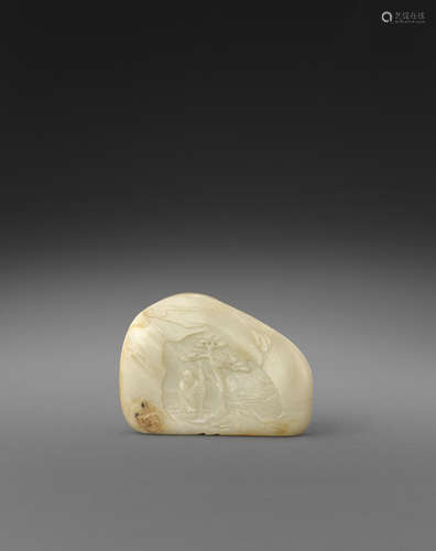 A carved jade landscape pebble