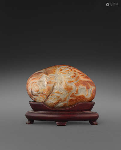 A carved jade boulder