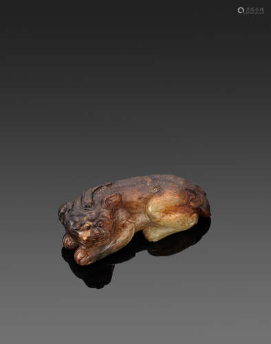 Ming dynasty or later A BROWN AND YELLOW JADE MYTHICAL BEAST