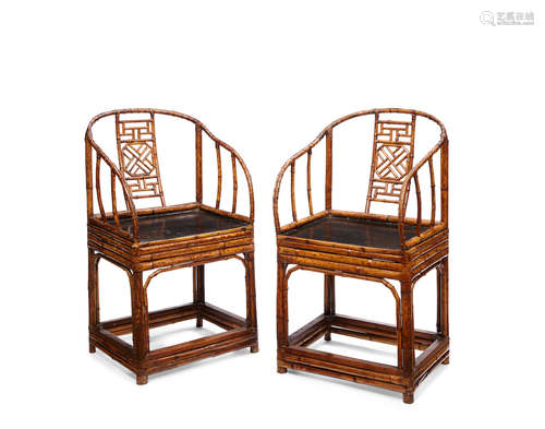 Late Qing/Republic period A pair of spotted bamboo horseshoe-back arm chairs, quanyi