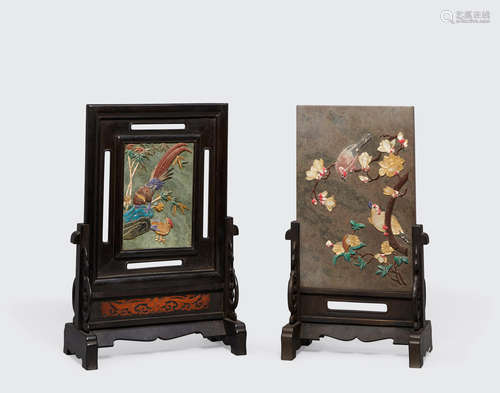 Two embellished soapstone rectangular panels mounted as table screens