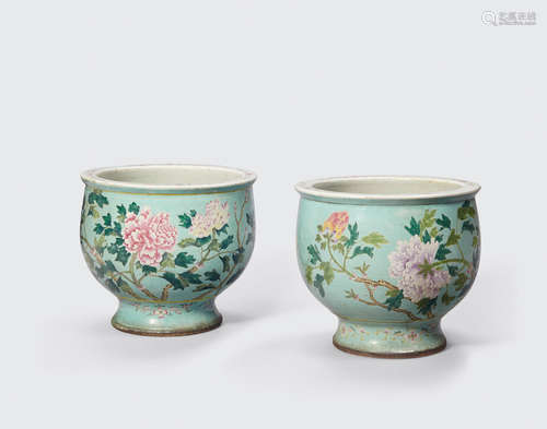 Late Qing/Republic period A pair of turquoise ground planters with famille rose enamel decoration