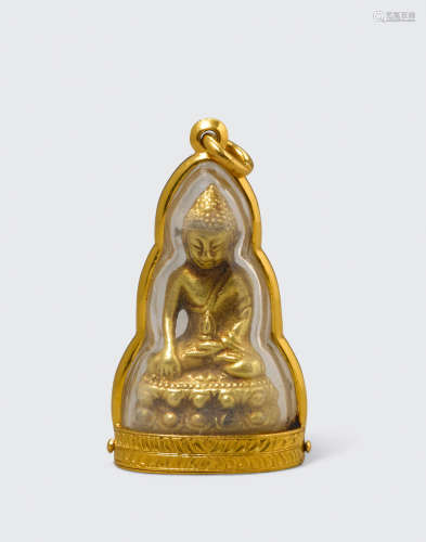 Thailand A gilt metal pendant of Buddha