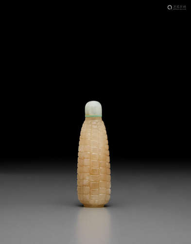 Late 19th/early 20th century A carved jade snuff bottle