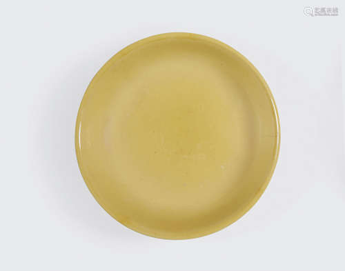 Kangxi mark, late Qing/Republic period A lemon-yellow glazed porcelain dish