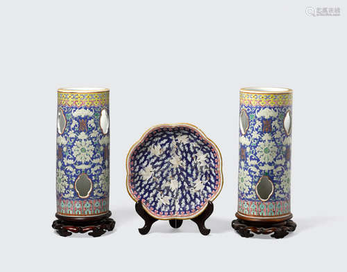 Late Qing/Republic period A group of three blue ground polychrome enameled porcelains