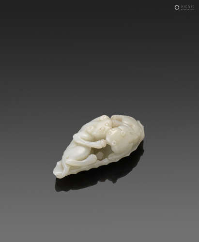 A white jade carving of two badgers on a leaf