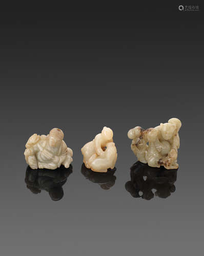 A group of three jade figural carvings