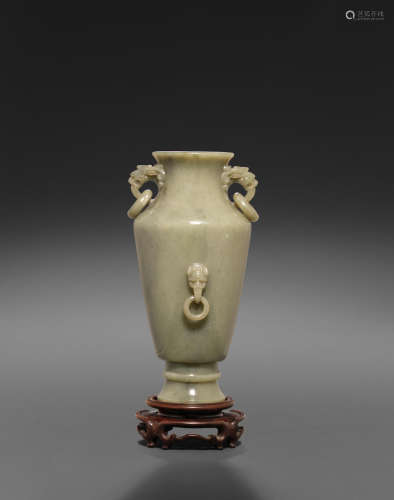 A sage green jade vase with loose-ring decoration