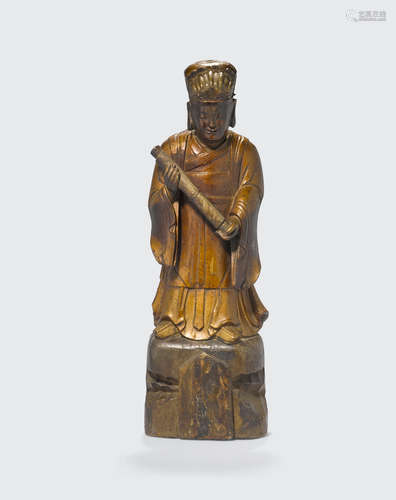 Qing dynasty A polychrome wood Daoist attendant figure