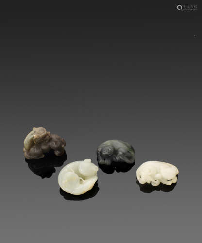 A group of three jade and one hardstone animal carvings